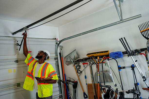 Professional Garage Door Installation technician working in Poweshiek County County, IA
